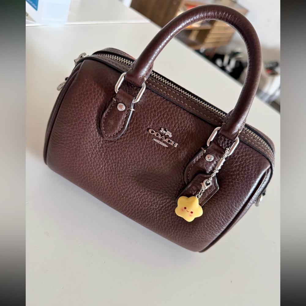 COACH Pebbled Leather Mini Satchel in Dark Brown with Yellow Charm